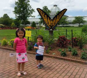 kids and tiger swallowtail butterfly LEGO brick sculpture