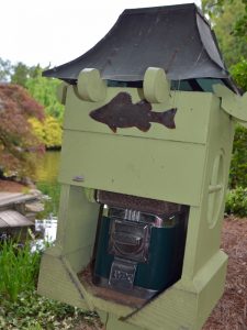 Fish food dispenser at the Garden