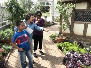 Brayden from World Pediatric Project touring the Garden